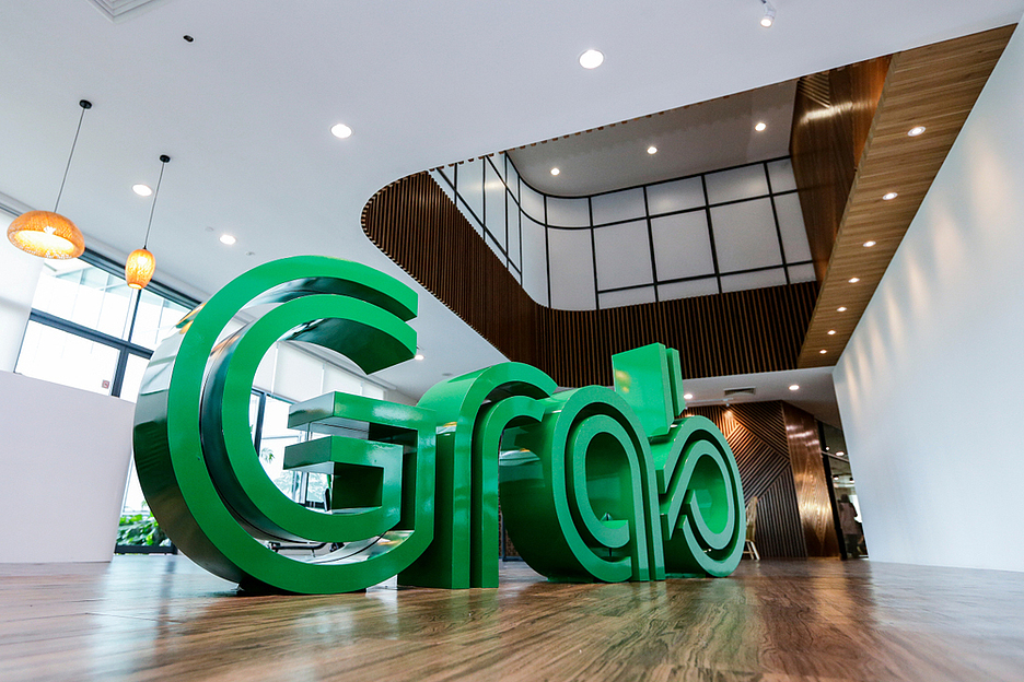 SoftBank инвестирует в Grab $2 млрд