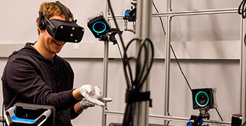 Zuckerberg shows a glove with positioning