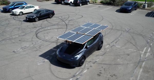 Driver makes a solar panel roof to charge his Tesla